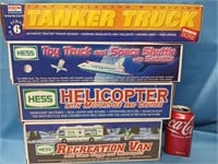 3 Hess Toy Trucks 2998,1999,2001 years and a