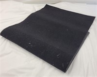 Single piece of carpet thick black material