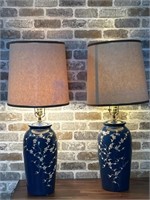 (2) Navy Lamps with White Ornamental Flower Detail