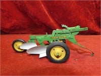 John Deere pressed steel plow toy.