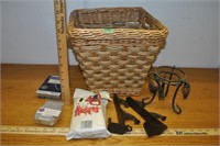wicker basket with NE raincoat, melts, candleholdr