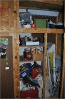 cabinet full of painting and drywalling supplies