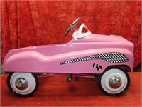 Pink Cadillac pedal car.