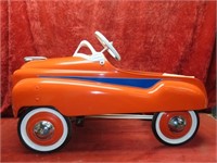 Nice orange Murray pedal car. Restored.