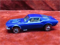 Red line Hot Wheels diecast car. Custom Mustang.