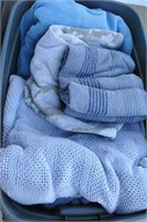 tote of towels and blankets