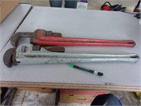 2 large pipe wrenches