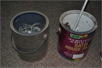 2 paint cans of conduit straps and clamps