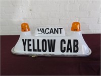 Charley's Yellow cab light up sign.