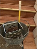 Old galvanized mop bucket