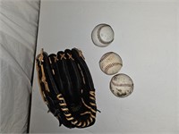 Worth baseball glove and 3 balls