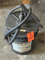 Bucket of Grease and Pump