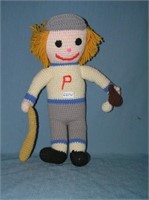 Hand crocheted baseball player plush toy with bat