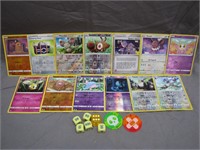 Assorted Lot Of Pokémon Cards & Game Pieces