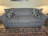 BLUE UPHOLSTERED COUCH