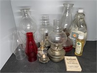 5 OIL LAMPS W/ CHIMNEYS, PARTS, & OIL