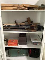 Contents of white cabinet/saws/clamps