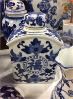 Blue and white covered square jar