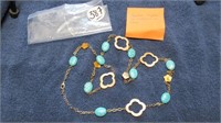 LONG GOLD COLOURED CHAIN WITH TURQUOISE STONES