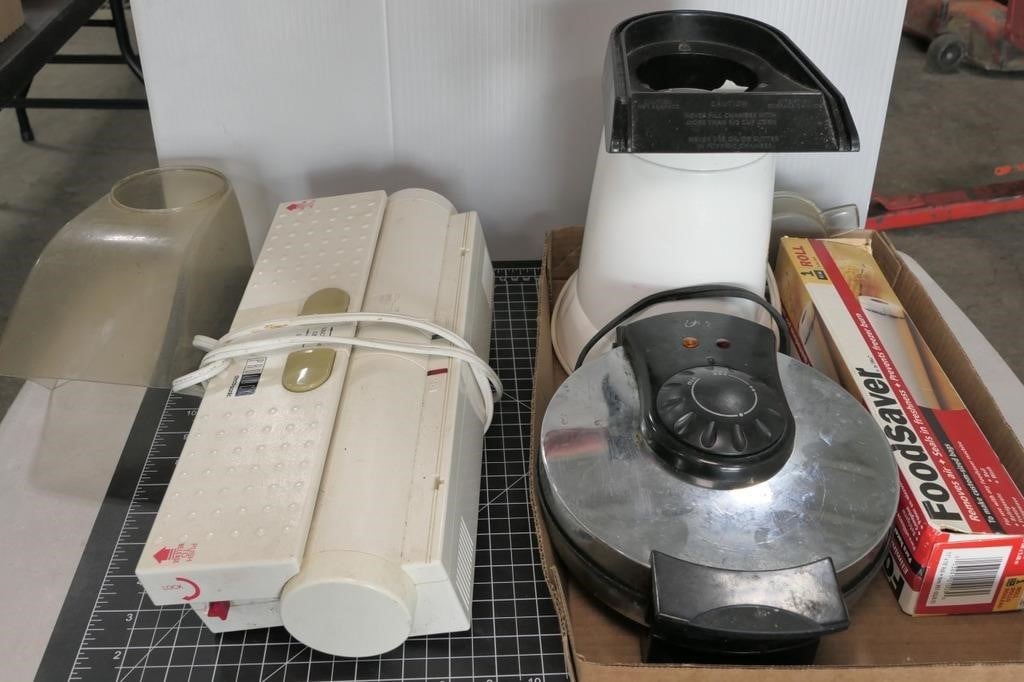 Air popper, waffle iron, vacuum sealer