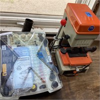 Key cutting machine/work zone rotary tool