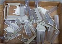 Lot of shelving label holders (?)