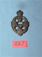 Antique brass British Army Corps badge