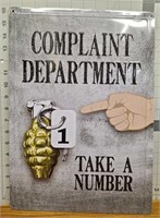 Metal sign " Complaint department take a  number"