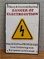 Danger of electrocution cast iron sign