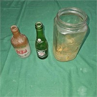 two bottles and a jar