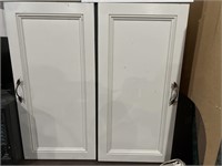 Set up two kitchen cabinets