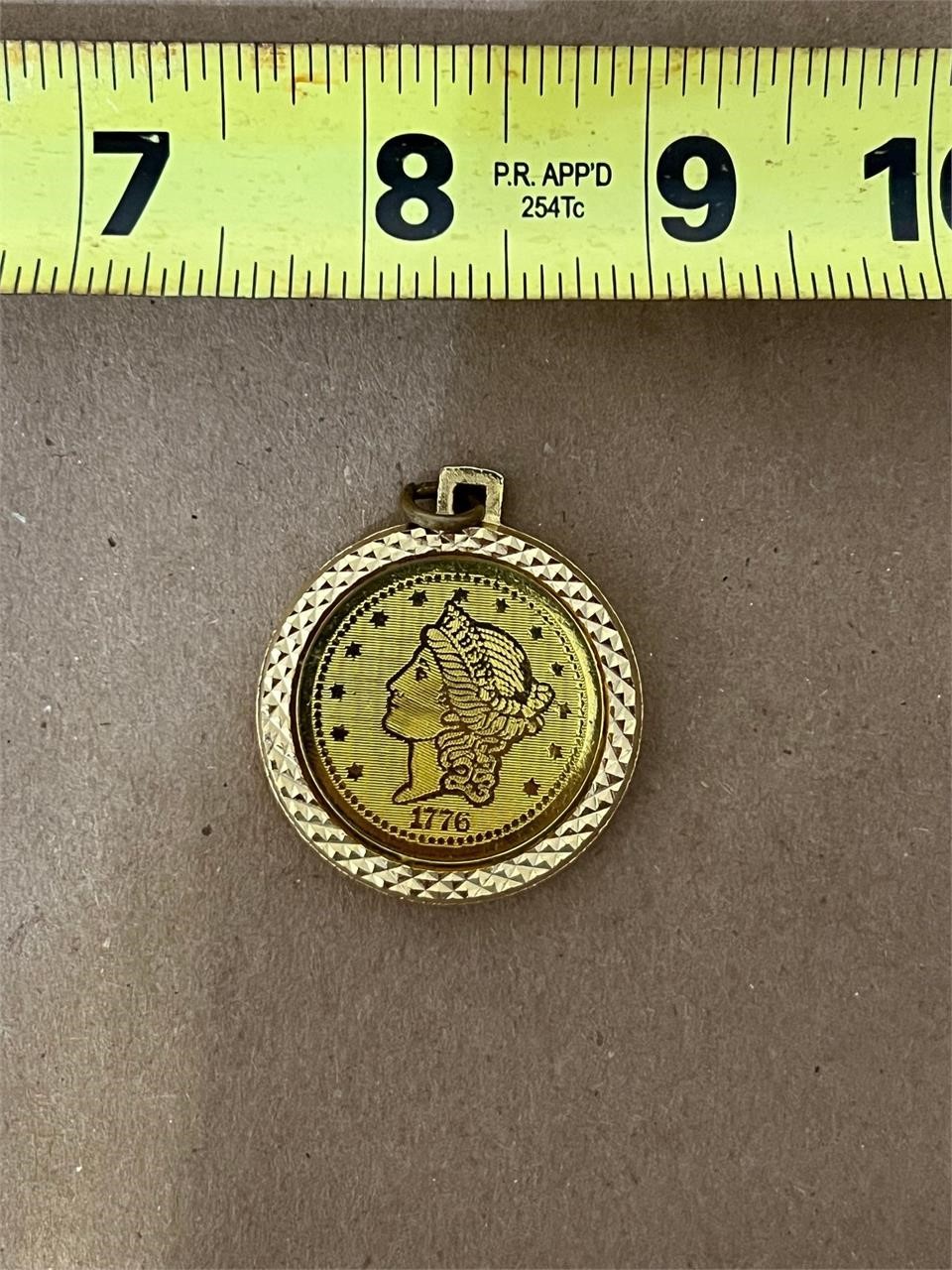 1976 20 D COIN PENDANT GOLD COLORED