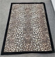 Belgium leopard print wool rug by Whitney
