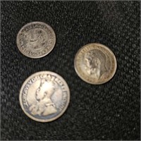 3 foriegn coins