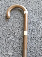 Vintage wood cane with sterling ring around top