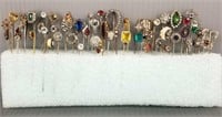 Group of 55 antique & vintage stickpins set with
