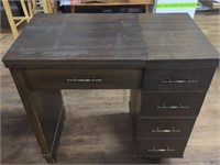 Sewing machine cabinet turned into a desk