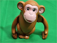 Wind Up Jolly Monkey Toy