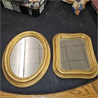 2 miniature gold mirrors