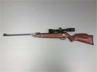 Beeman air rifle with scope
