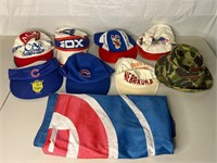 Lot of Sports Hats and Cubs Flag