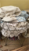 Laundry bin with linens