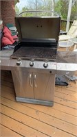 Grill with tank