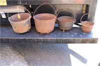 Set of Four Antique Cast Iron Pots