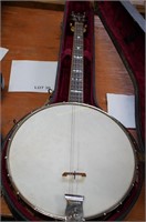 Triple X banjo w/hard shell case