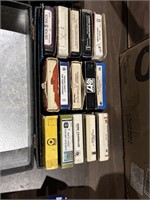 Eight track tapes in case