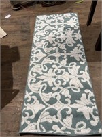 5 1/2 foot long rug