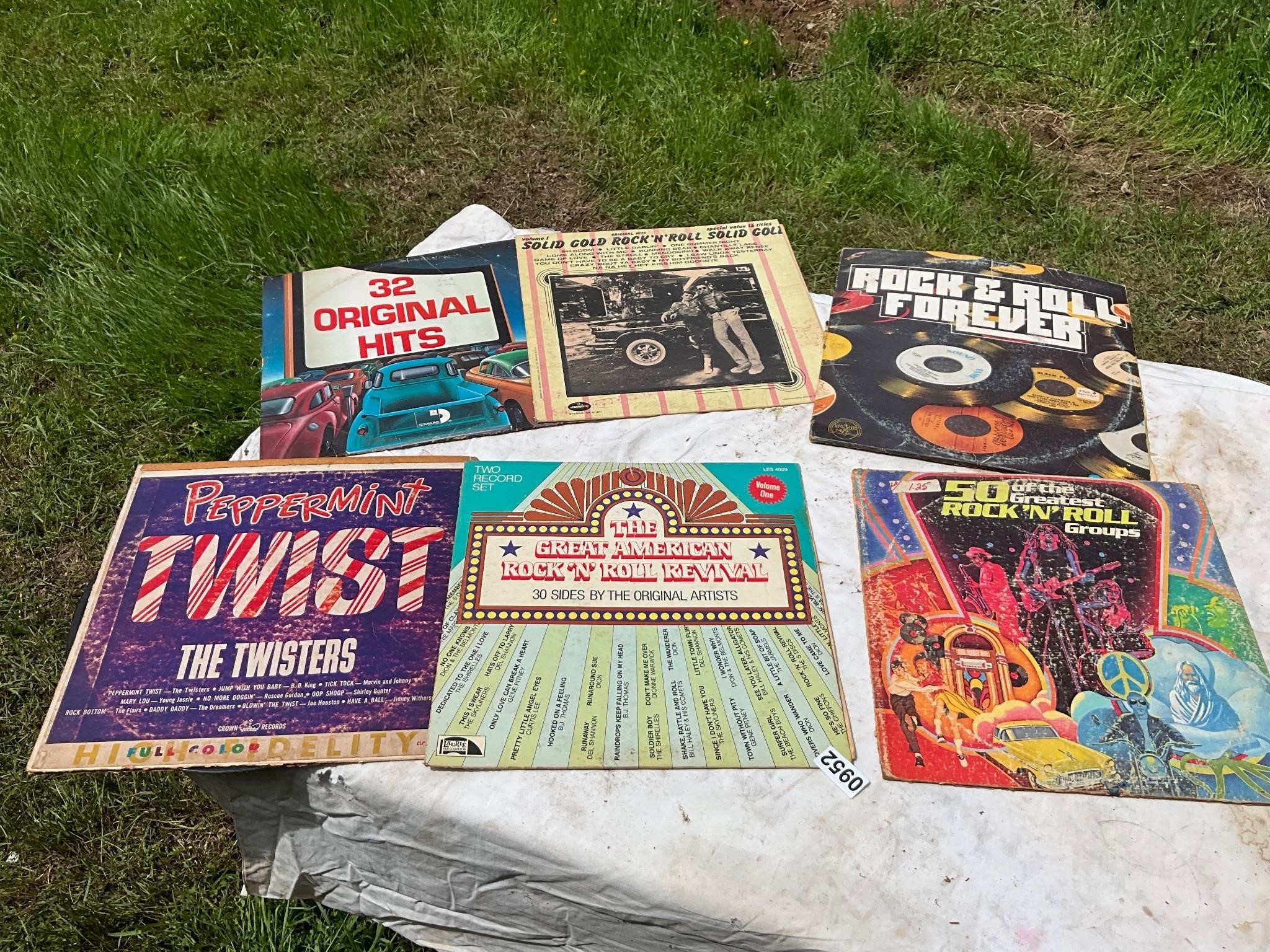 6- assorted rock and roll vinyls/ records