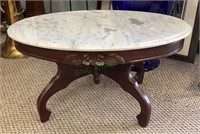 Antique marble top coffee table with mahogany