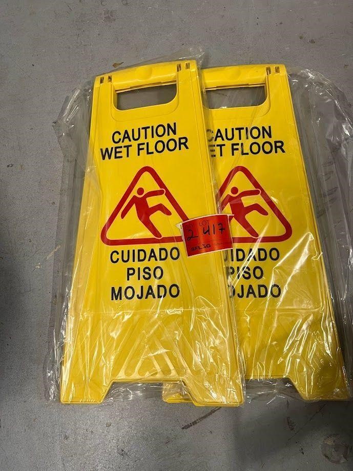 (2) Caution wet floor sign
